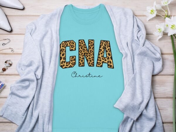 4563d7b2-9748-4b22-9b4e-386013dd9595 Personalized CNA T-Shirts, Leopard Print Custom Name Nurse T-Shirt, Certified Nursing Assistant Appreciation Gift, Christine Name Tee